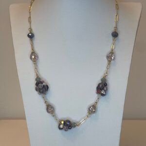 1235c0b9-5484-4891-b6fc-932e6afed503.jpg ketting met paarsroze kralen