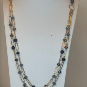 lange ketting met gouden schakel en grijze kralen