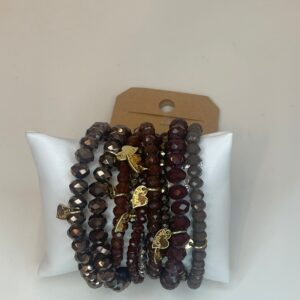 4ebe9a97-05f1-4841-b248-e727fe6af959.jpg set armbanden donkerbruin