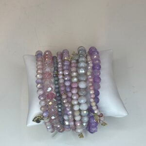 68f32fdd-5c4b-473c-8176-16e3603aeda5.jpg set armbanden roze/paars